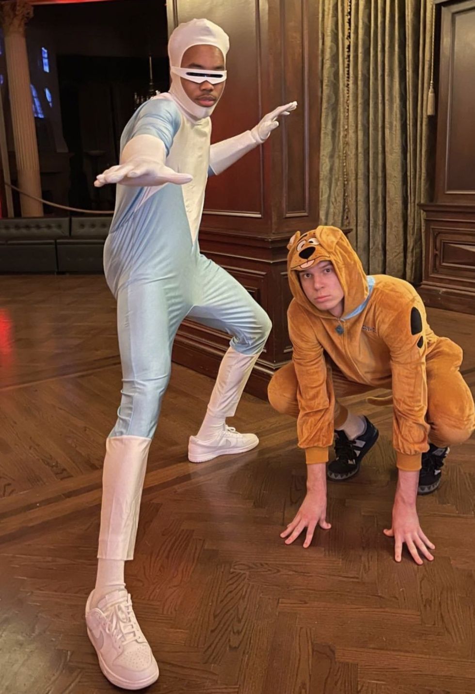 Scottie Barnes and Gradey Dick in Halloween costumes.