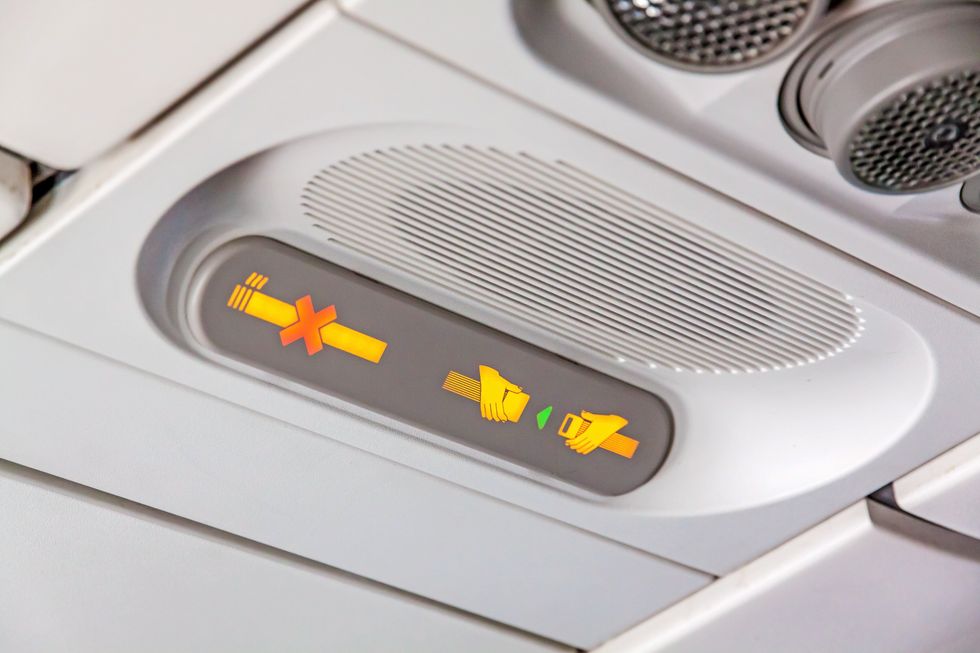 Seatbelt sign on an airplane.