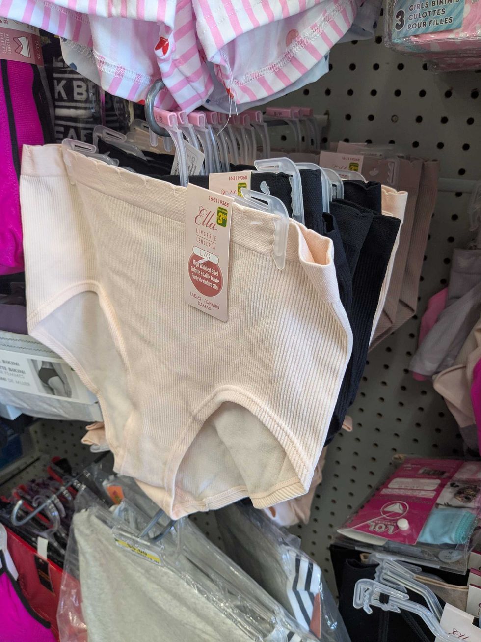 Set of women's underwear hanging on a shelf at Dollarama