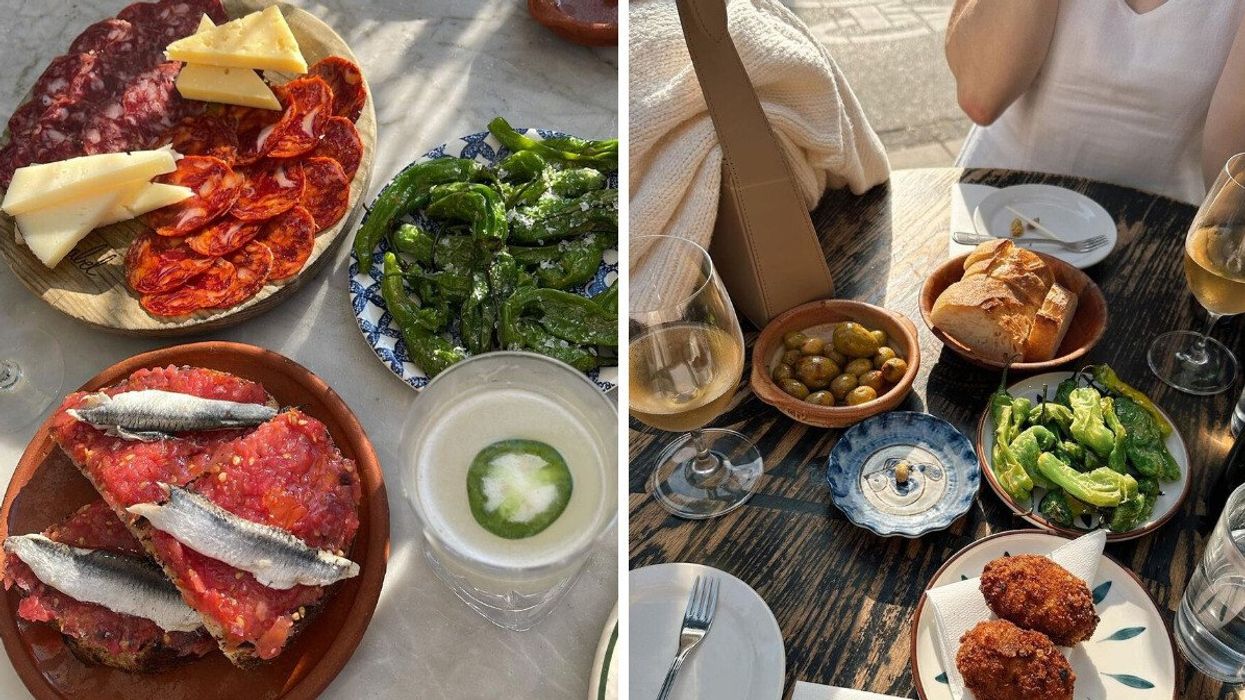 Several small plates of Spanish food and drinks laid out on two tables.