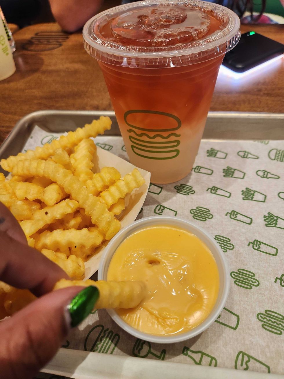 Shake Shack fries and cheese sauce.
