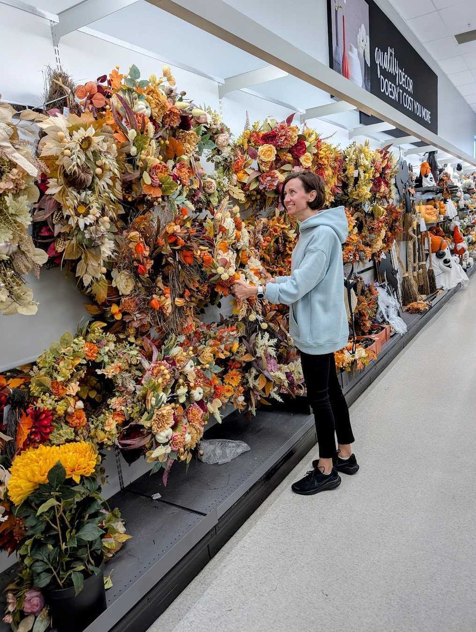 Shelves filled with a big selection of seasonal wreaths.