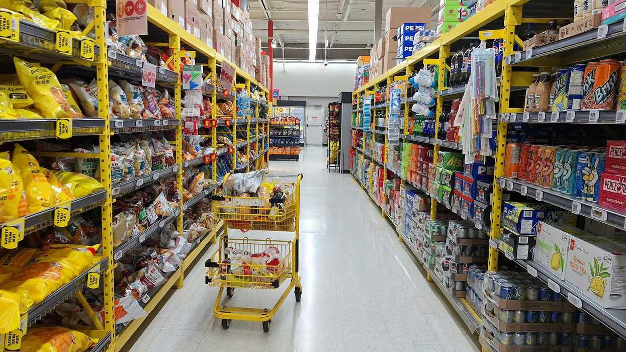 shopping cart in aisle of grocery store in canada