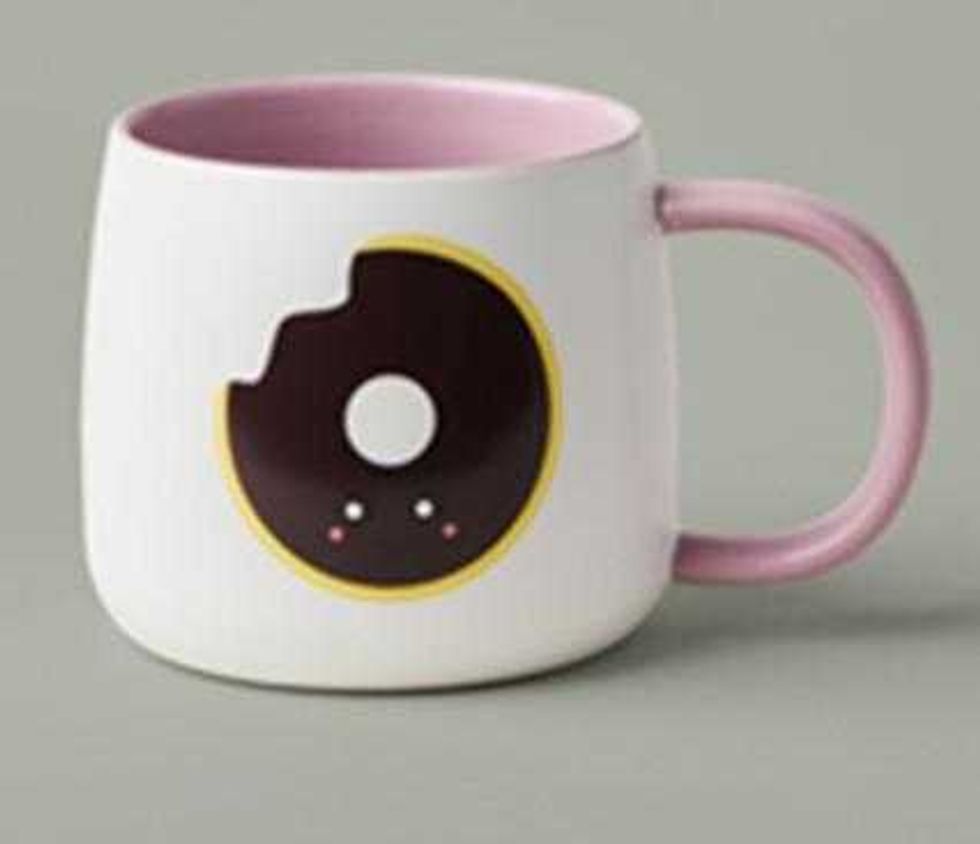 side view of recalled tim hortons pink and white colour changing donut mug