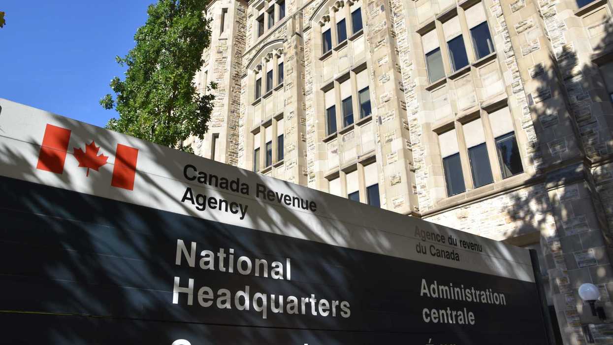 sign in front of canada revenue agency national headquarters building in ottawa