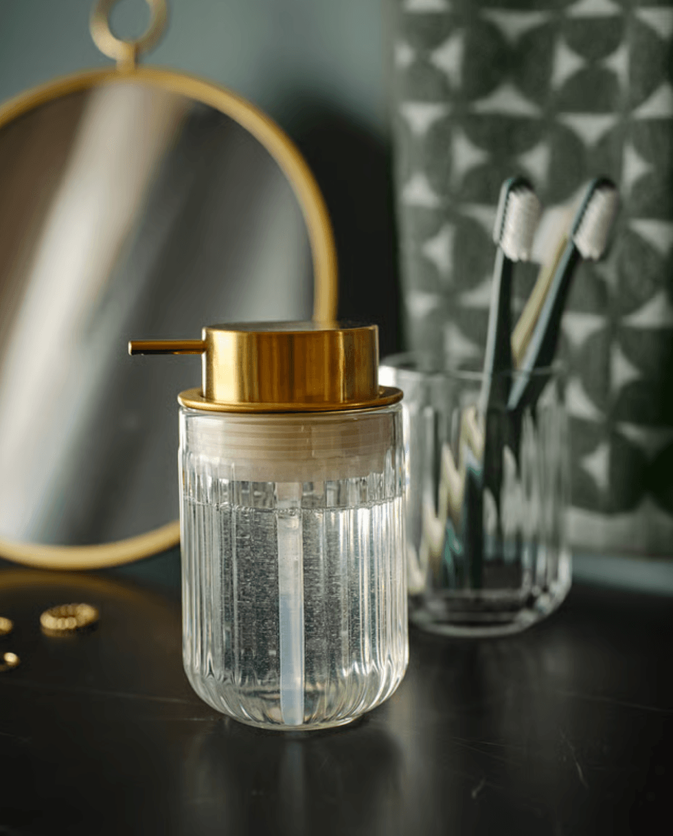 SILVTJ\u00c4RN soap dispenser on a bathroom vanity.