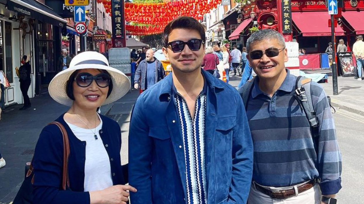 Simu Liu in London's Chinatown with his parents.