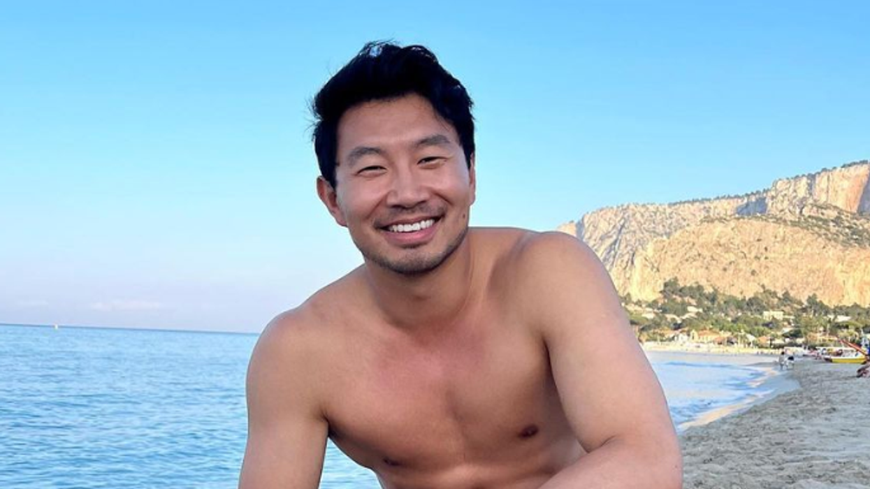Simu Liu on a beach in Sicily.