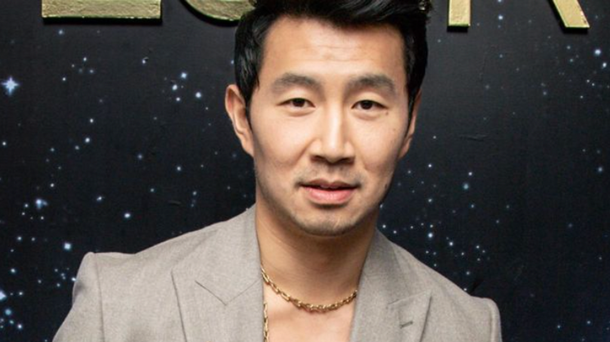 Simu Liu on a red carpet in Toronto for Tiffany & Co.