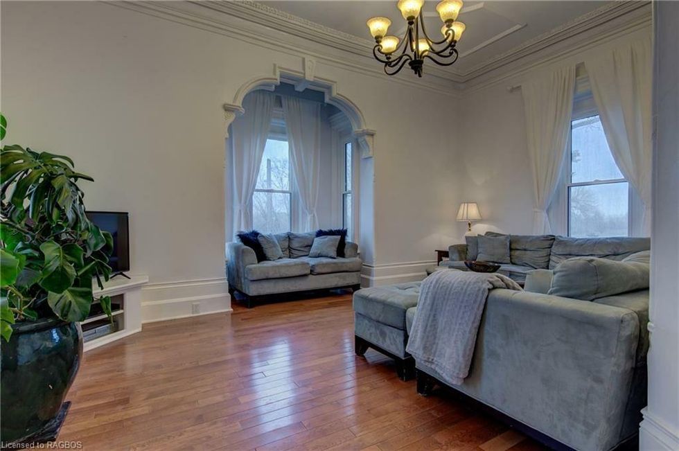 Sitting area with large windows.