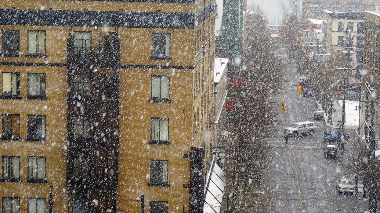 Snowstorm in downtown Vancouver near Pender and Abbott streets.
