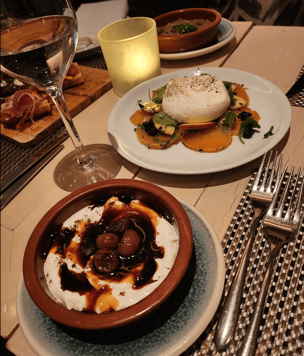 Some plates of food on a table.