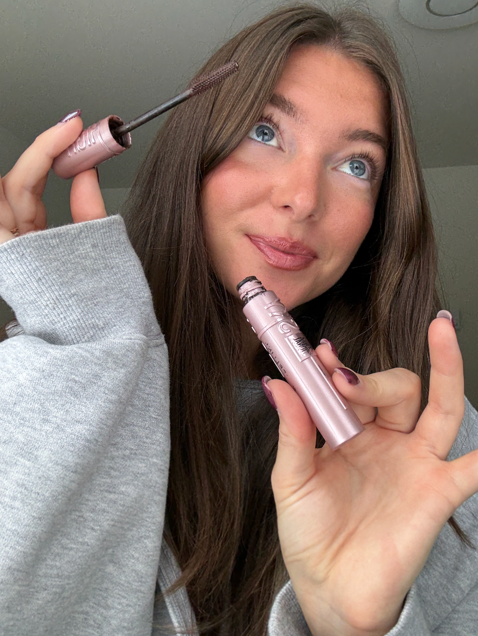 Someone holding Maybelline Sky High Mascara.