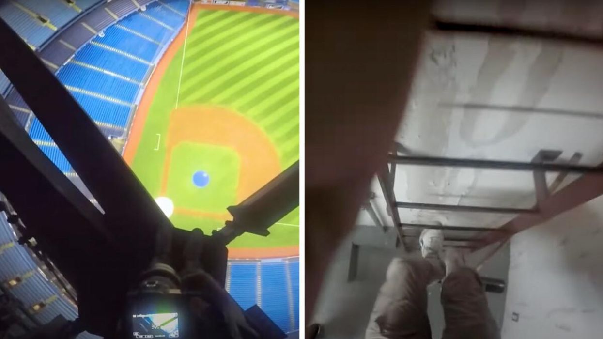 Someone on top of the Rogers Centre catwalk.