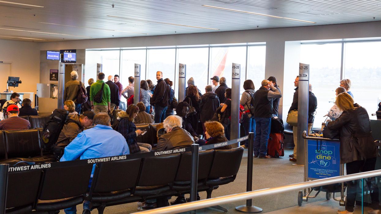 Southwest Airlines passengers waiting after a flight cancelation.