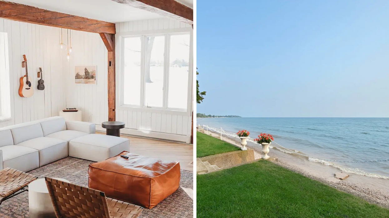 Spacious living room with lake views backing on to private beach in Niagara, Ontario.