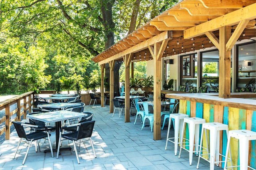 Spacious tropical patio next to Constance Bay Beach near Ottawa.