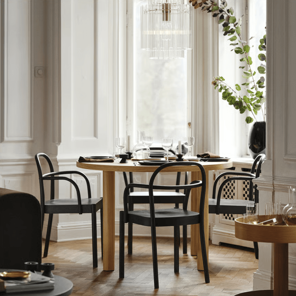 STOCKHOLM 2025 dining chairs in a dining room set up.