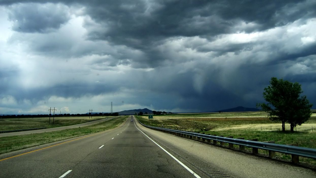 Storm clouds over a highway.