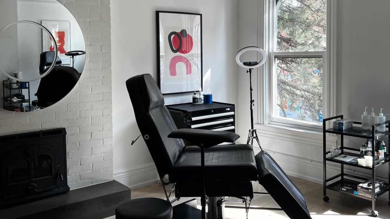 Tattoo chair by window.