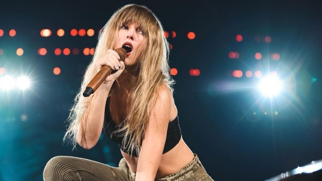 Taylor Swift on stage rehearsing for The Eras Tour.
