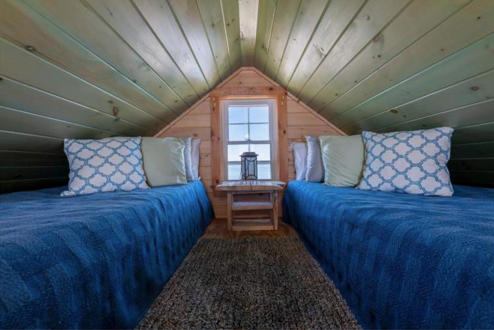 The bedroom loft in the living area of the cottage on Duck Ledges Island.