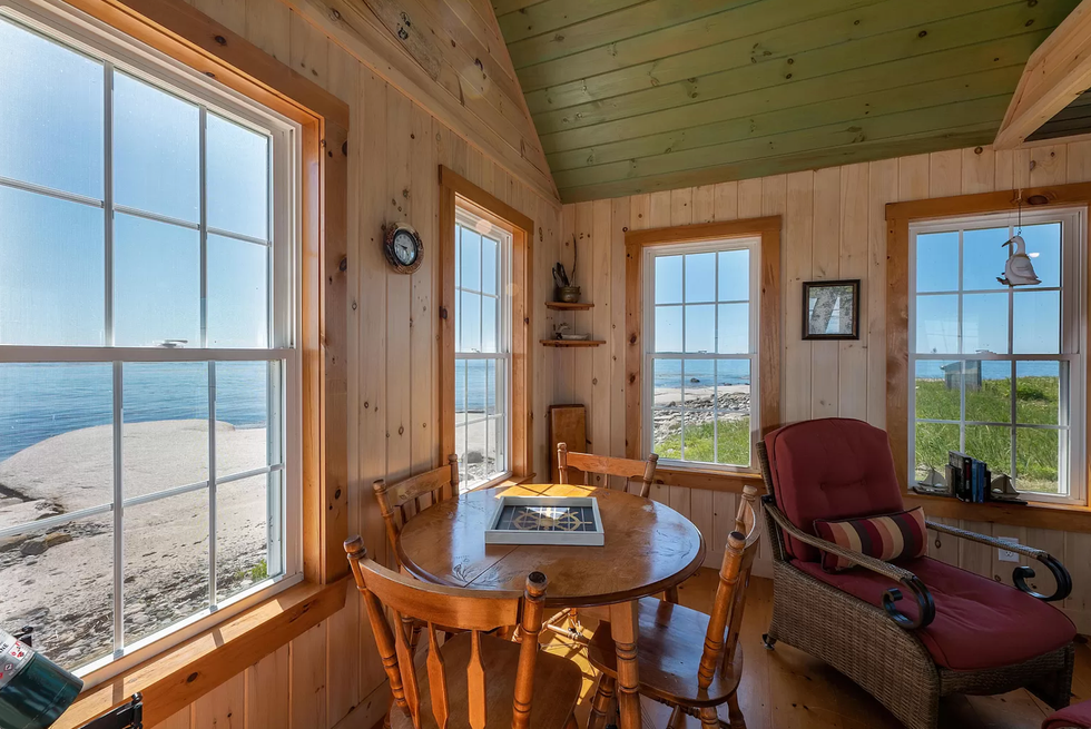 The breakfast nook in the living area of the cottage on Duck Ledges Island.