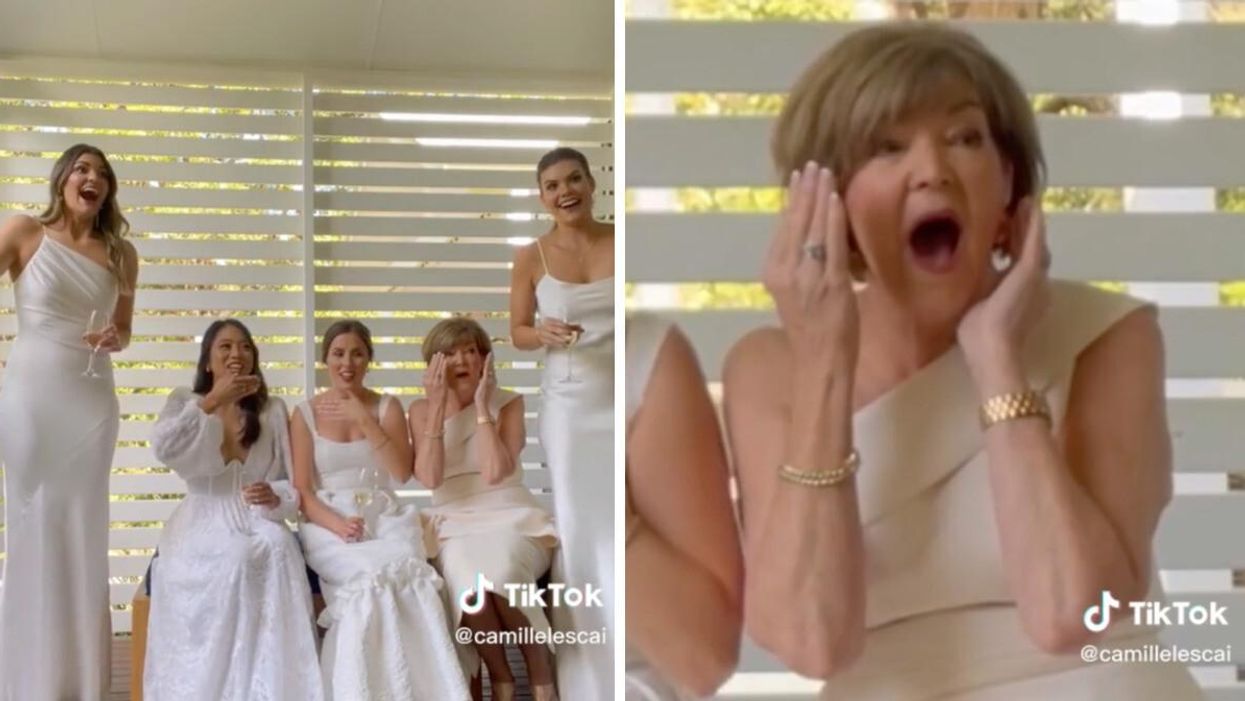 The bridal party's reaction to seeing the bride in her wedding dress.