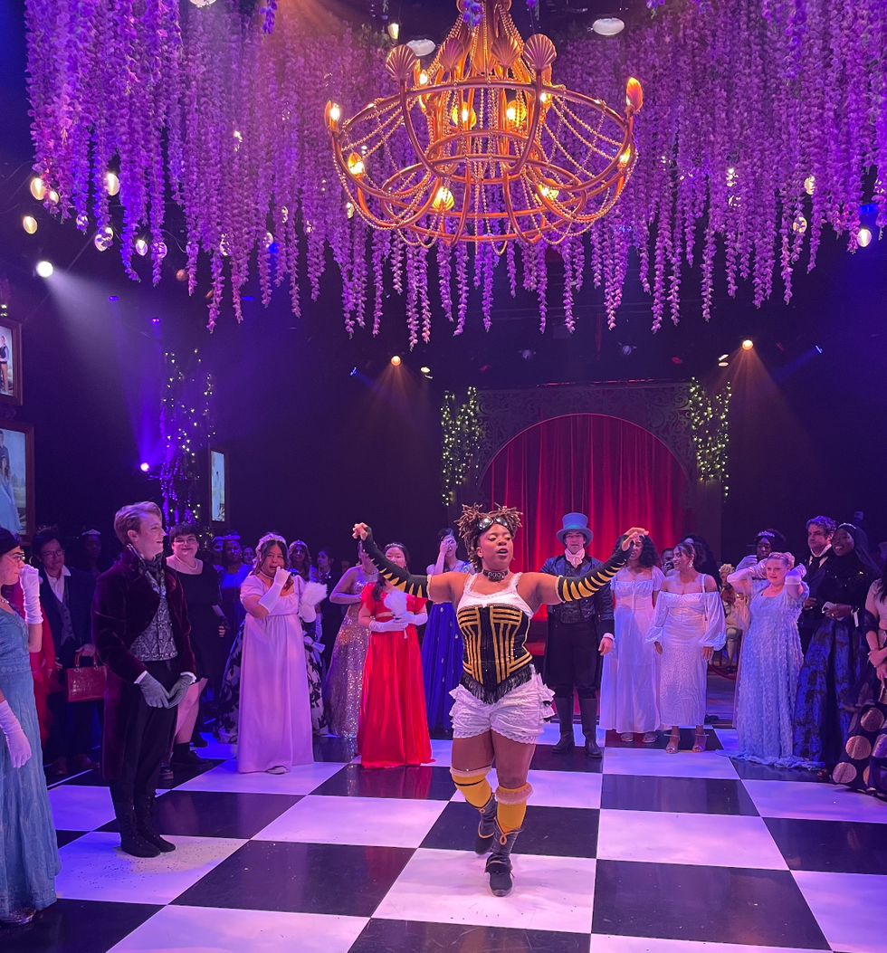 The Bridgerton bee dancing in the middle of the ballroom.