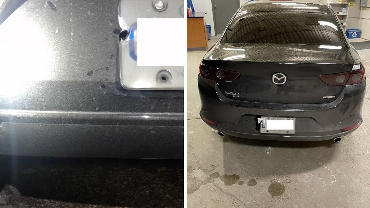 The car that was hit with bullets on Highway 400.