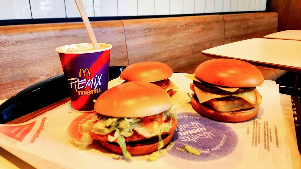 The Chicken Cheeseburger, Surf ‘N Turf Burger, Sweet Chili Junior Chicken and the Apple Pie McFlurry on a tray.