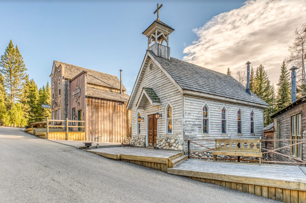 The church and buildings on the ranch.