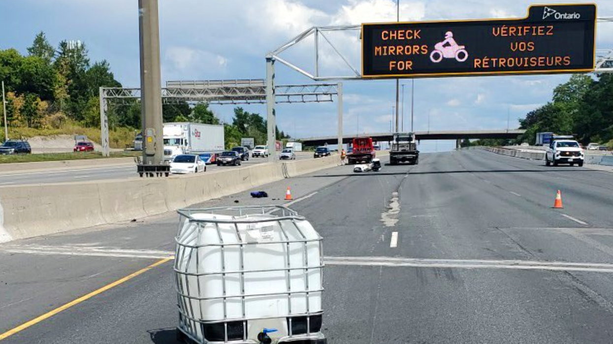 The container that fell off a vehicle on Highway 401.
