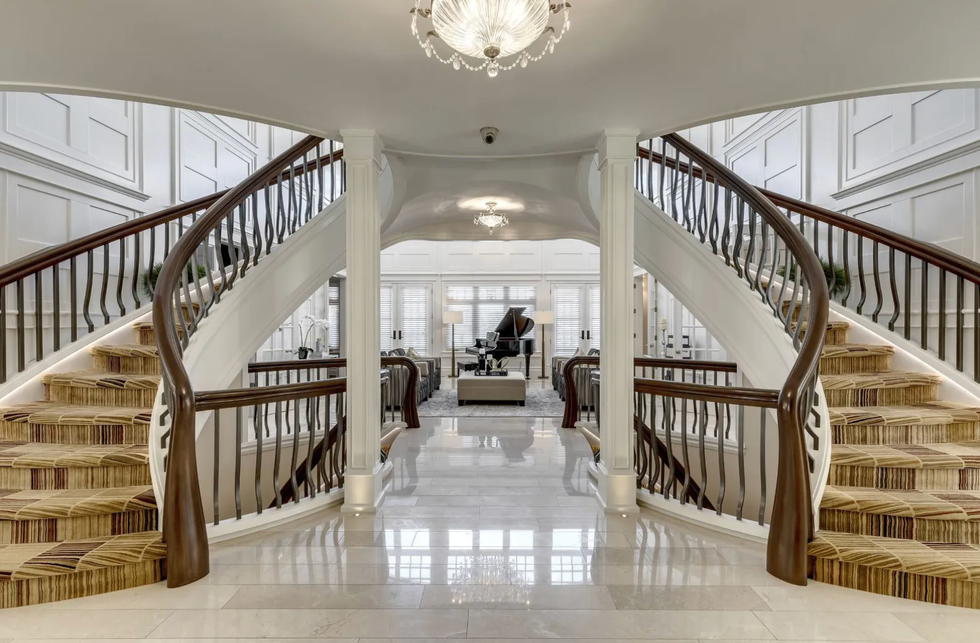 The double staircase that leads into the main living area.