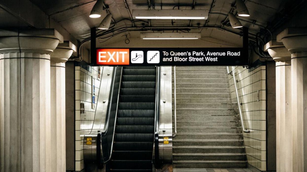 The exit sign inside of a TTC subway station.