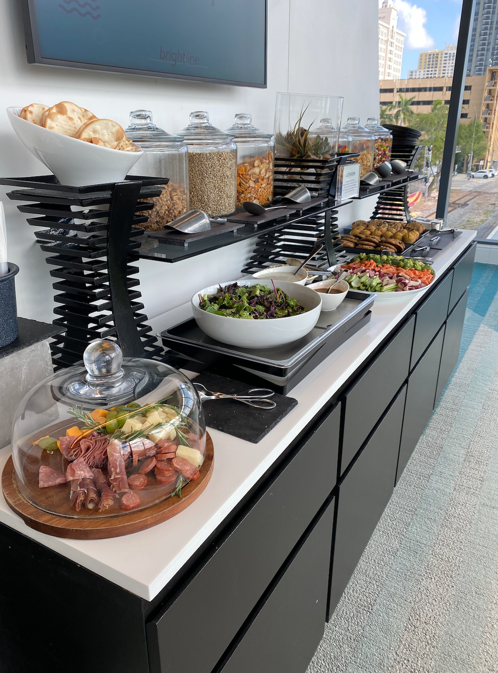 The food area in the Premium lounge at the Brightline train station.