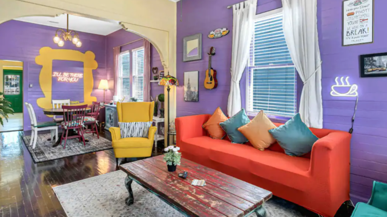 The 'Friends'-themed Airbnb interior: a colorful living room and a dining room.
