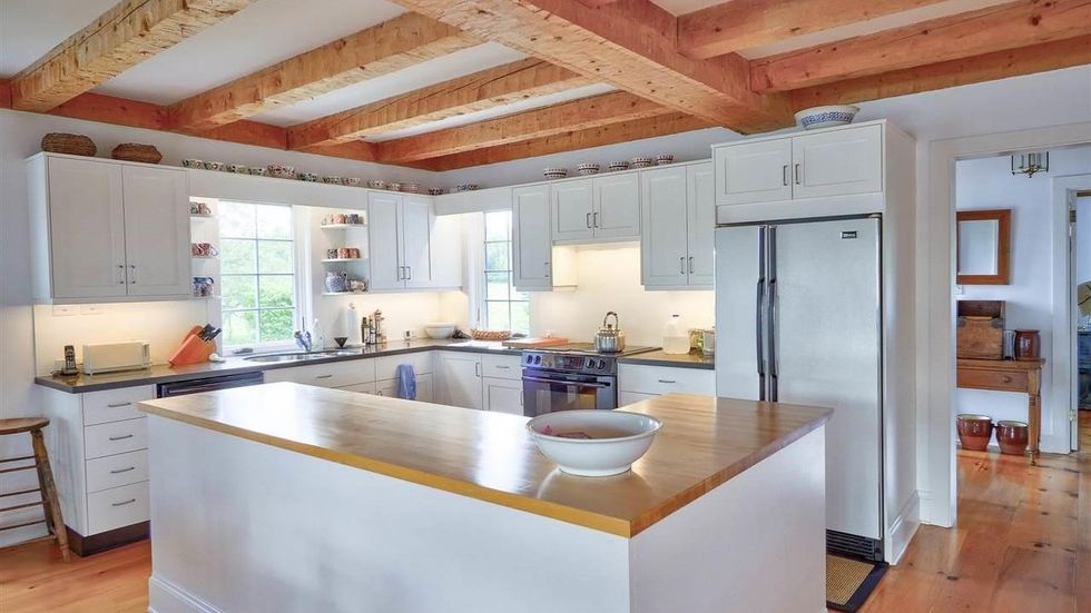 The house's kitchen with a large island.