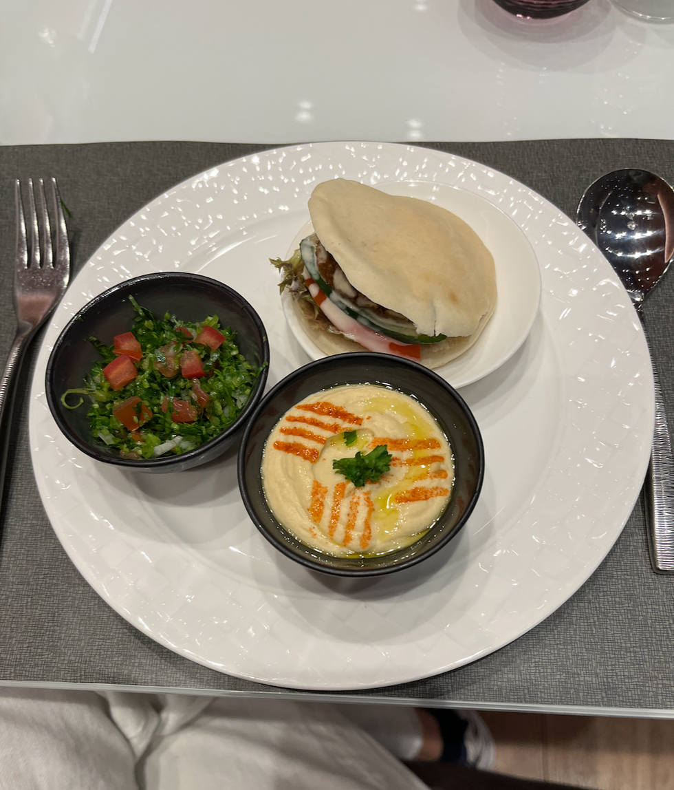 The hummus, tabouleh and falafel sandwich at the the Qatar Airways Al Mourjan Business Lounge restaurant.