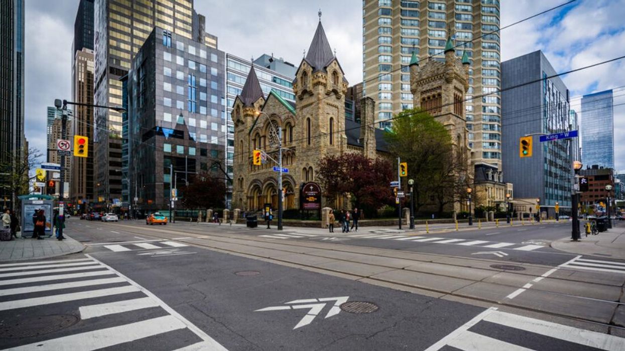 The intersection of King Street West and Simcoe Street, in downtown Toronto, Ontario.