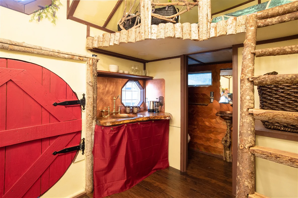 The kitchenette and bathroom inside Hobbit's Hollow.