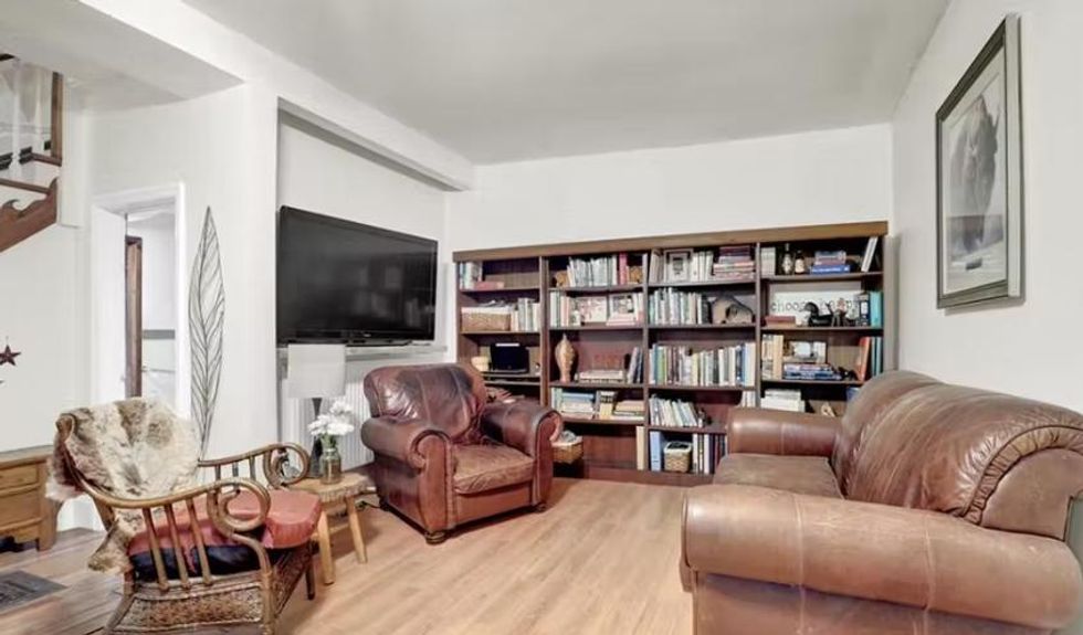 The living room and library.