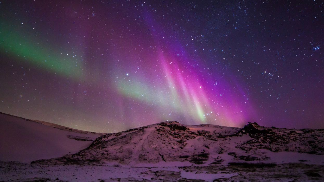 The northern lights are seen in the sky in winter.