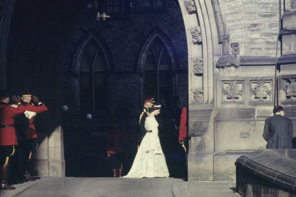 The queen enters Centre Block, on Parliament Hill.