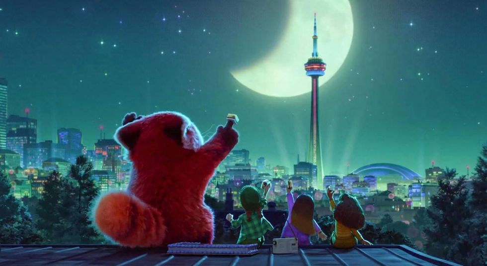 The red panda and her friends looking at the Toronto skyline.