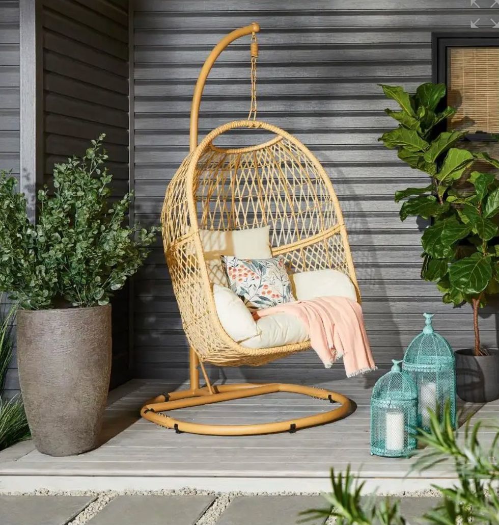 The Rochefort Hanging Basket Chair ready for lounging in.