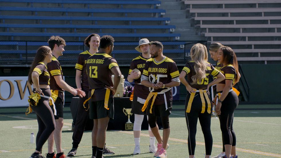The Season 4 cast of Love Is Blind playing flag football.