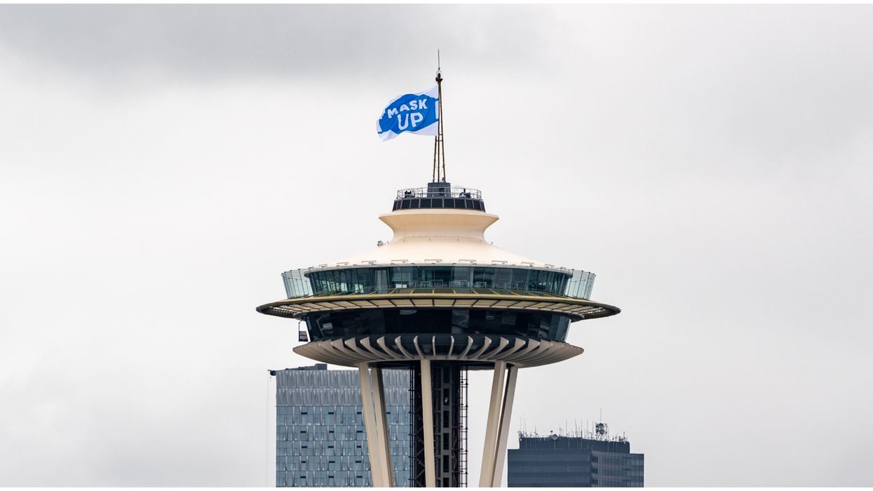 The Seattle Space Needle Raises A Flag To Remind People To Wear Face Coverings
