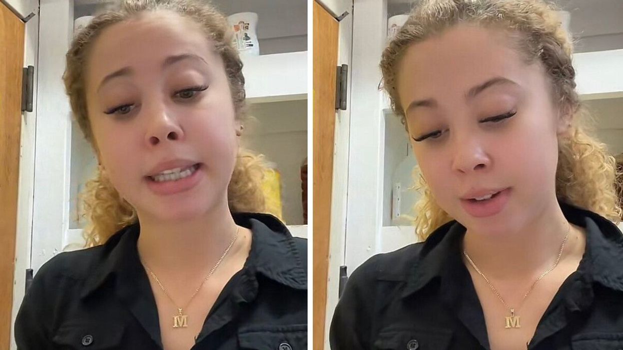 The server making a video about her tips.