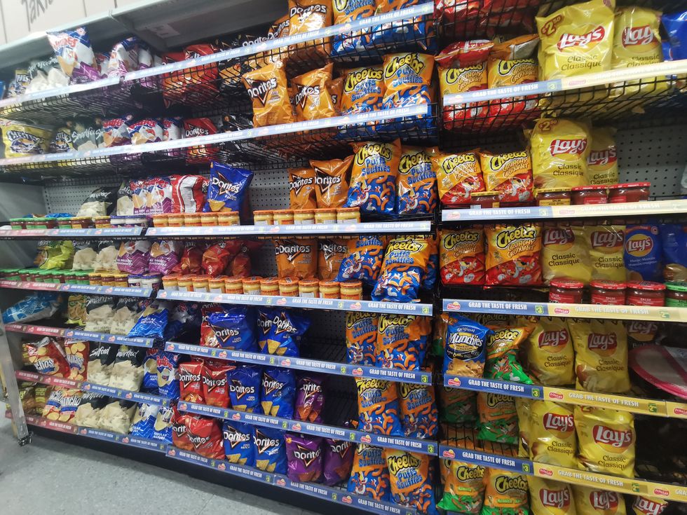 The shelves stop with potato chips at Dollarama.